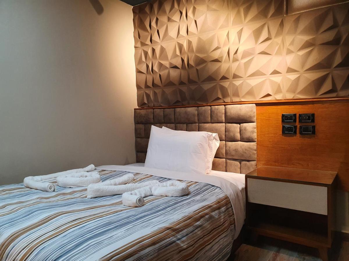 Oxford Hotel & Restaurant Кайро Екстериор снимка